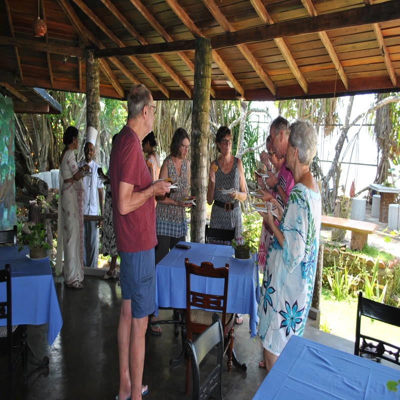 Guests enjoying healthy sustainable dining at Sunshine Restaurant Barberyn Reef Ayurveda Resort, Sri Lanka.